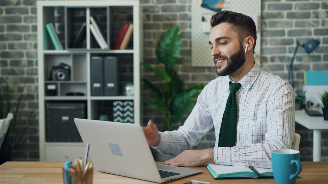 confident businessman at desk